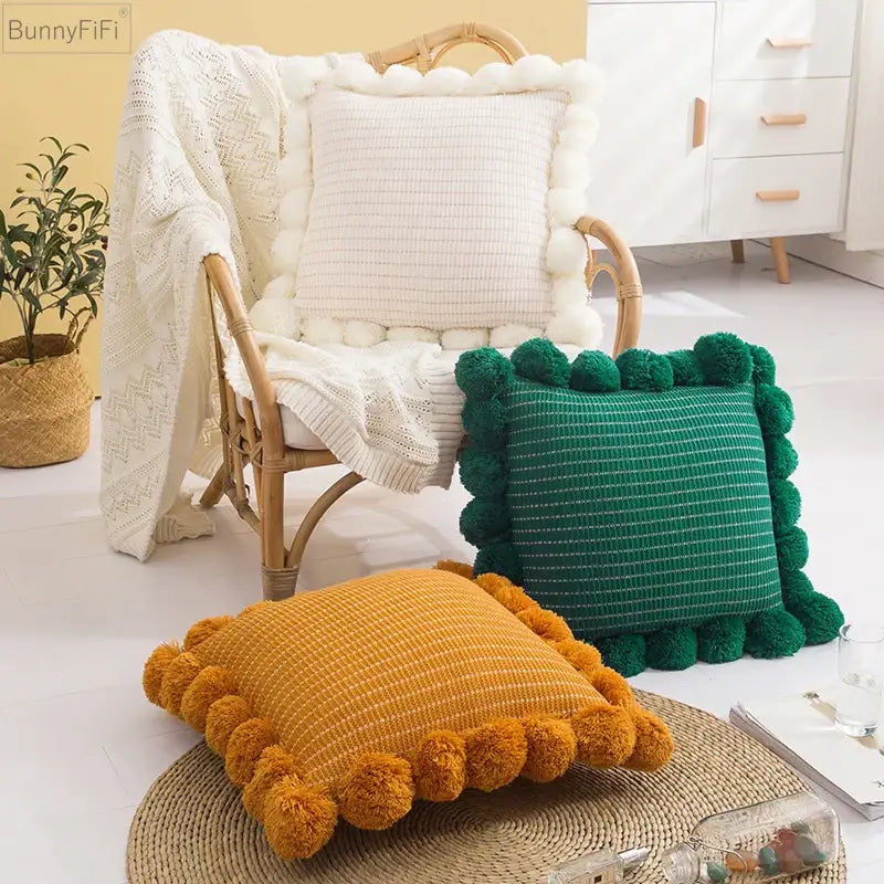 Orange textured ball cushion cover with pompoms living room decor