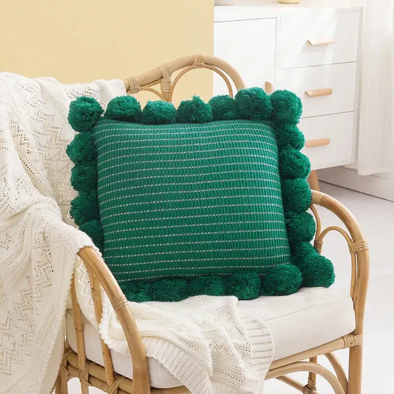 Orange textured ball cushion cover with pompoms living room decor