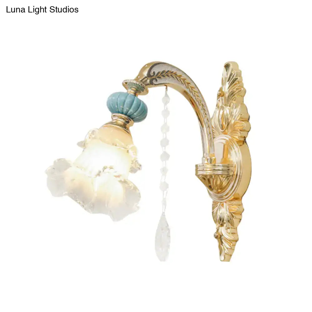Ornate gold and blue glass wall mount light bedroom sconce