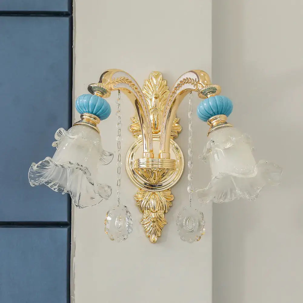 Ornate gold and blue glass wall mount light bedroom sconce