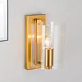 Post modern brass wall sconce with gold tone, clear textured white cylindrical glass shade, and exposed bulb for bedroom lighting 110v-120v 220v-240v