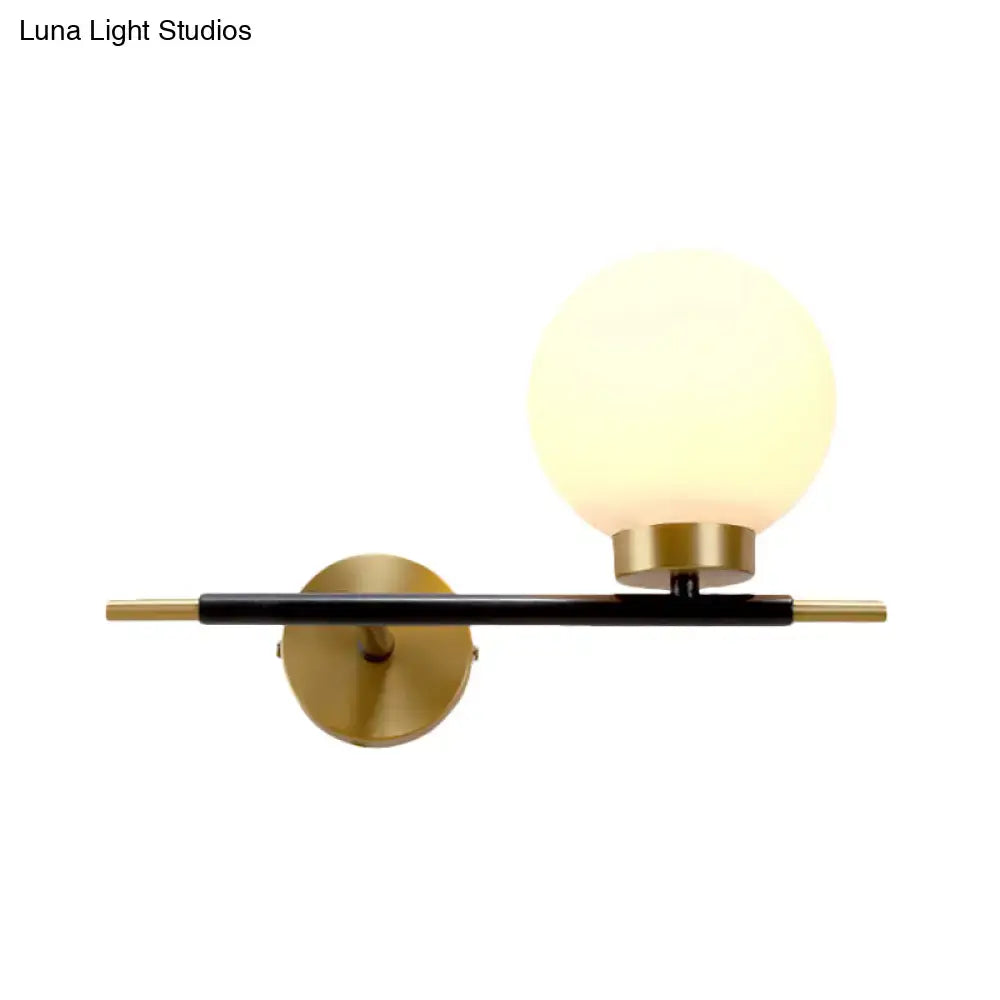 Post-modern white and brass sphere wall sconce bedroom light