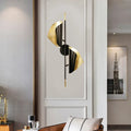 Postmodern gold and black wall mounted lamp metal sheet sconce with sleek sculptural leaf-like shades for stairway wall light
