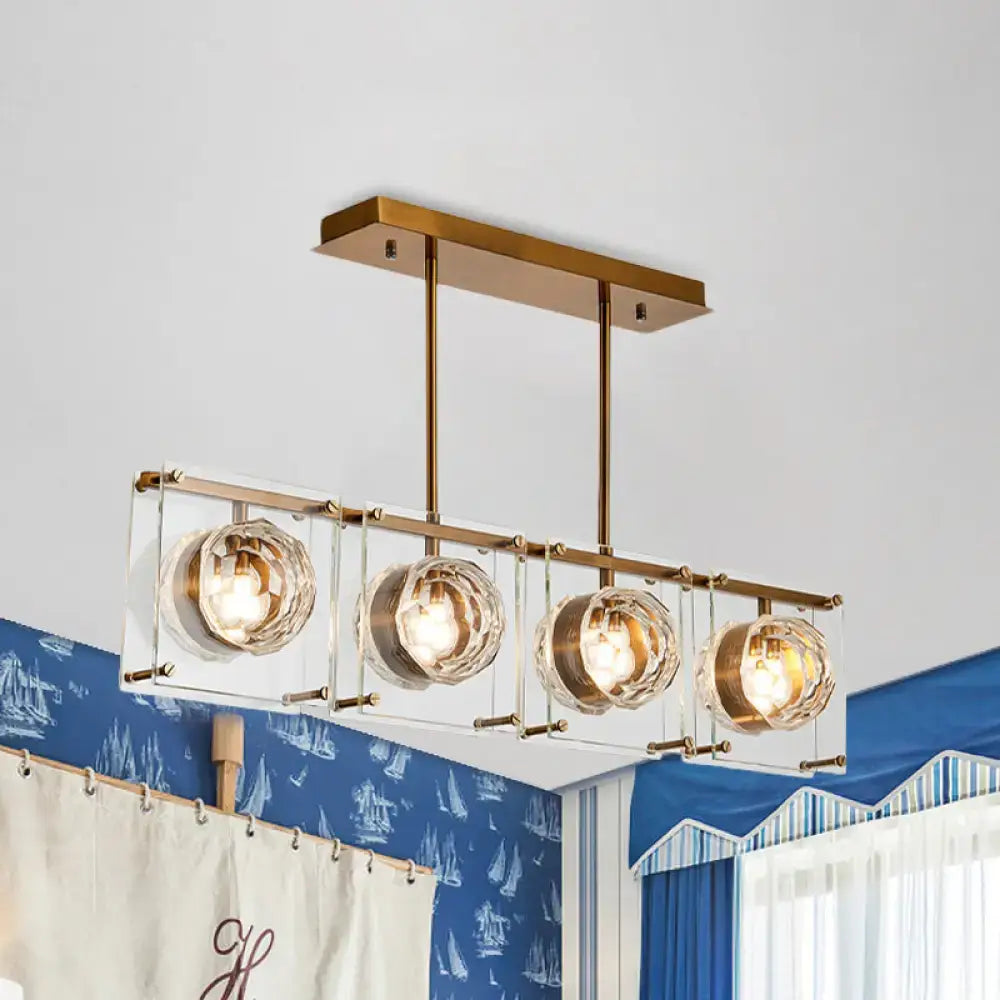 Postmodern gold and clear glass 3-light kitchen island light