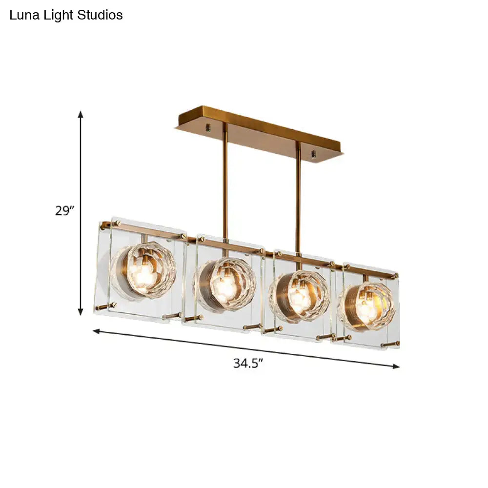 Postmodern gold and clear glass 3-light kitchen island light