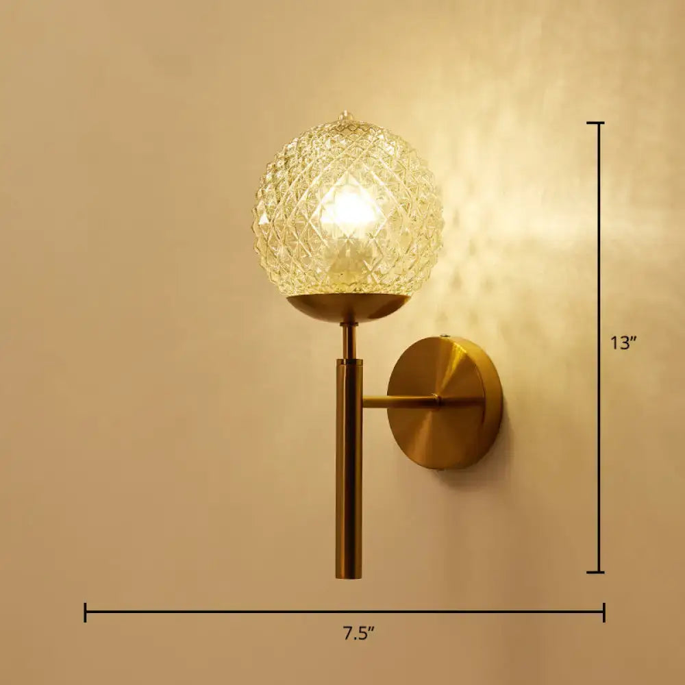 Postmodern gold ball shaped wall sconce with textured glass shade bedroom light