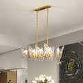 Gold-toned butterfly chandelier with clear crystal wings and brass frame for 220v-240v e12 e14 bulb base lighting