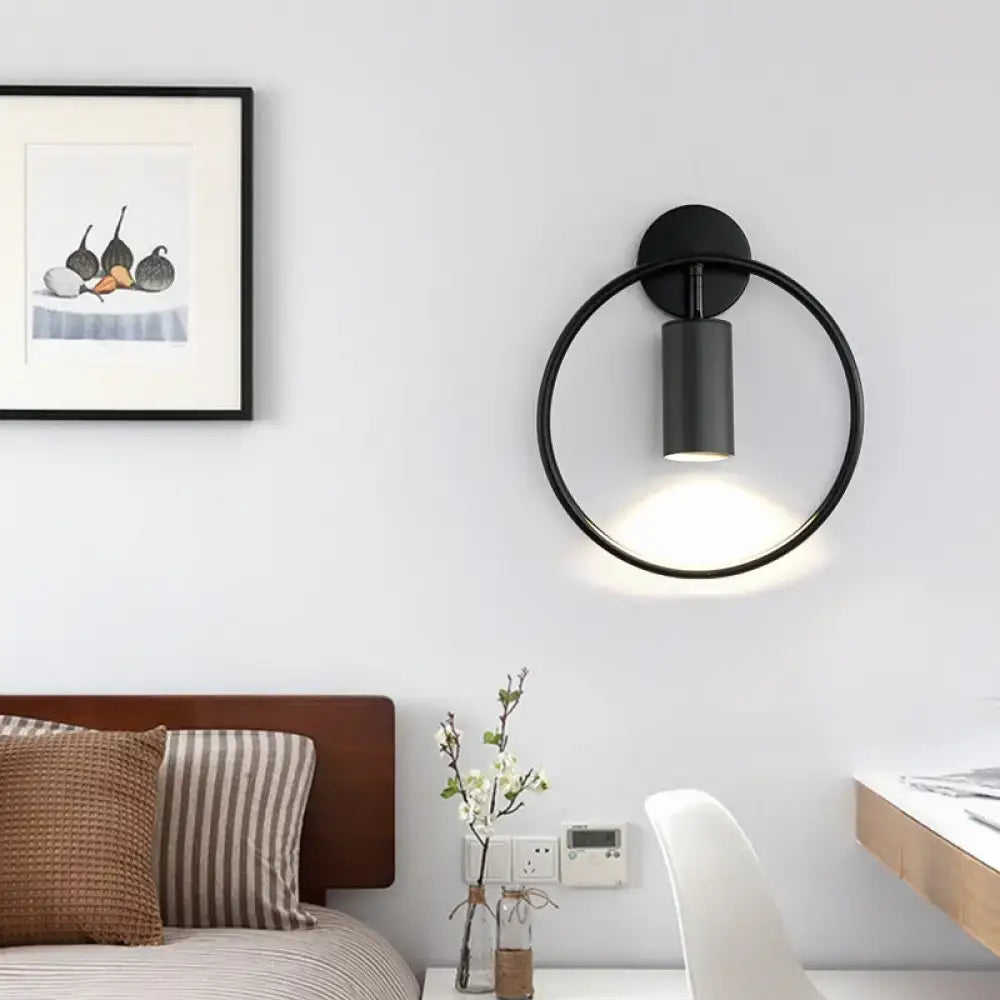Black circular postmodern gold halo ring wall sconce with cylindrical light fixture 16 inches fixture height
