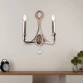 Antique brass two-light wall light with crystal accents and dangling faceted pendant in retro loft fabric aged silver finish