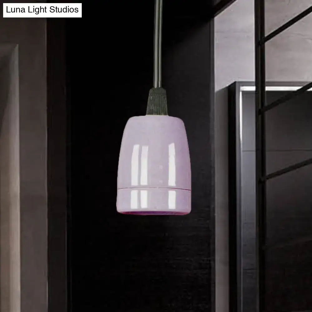 DecorBites™ pendant light with a sleek lavender glass shade and metallic suspension, featuring black red ceramic fixture
