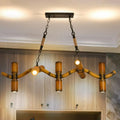 Decorbites 10-light metal brown island lighting fixture with rustic bamboo chandelier arms and brass accents