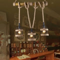 Decorbites farm birdcage island lamp is a 3-light ceiling light with black metal frames and beige jute rope cord suspension