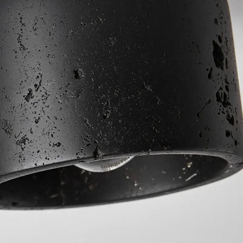Rustic black travertine ceiling light for entrance hallway