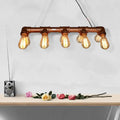 Copper pipe industrial pendant light with five exposed edison bulbs as metal linear island lighting for living room