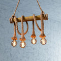 Rustic bamboo island light with thick beige rope and four glowing filament bulbs from decorbites lodge industrial series