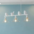 Rustic white bird island light kitchen fixture with clear glass