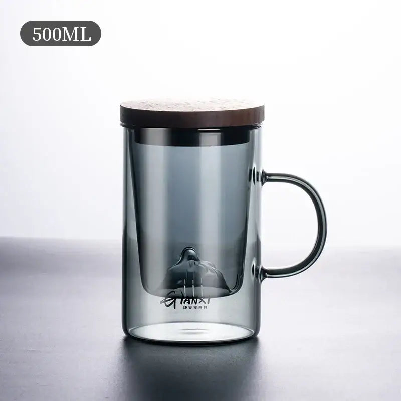 Sleek dark gray double walled glass tea cup with wooden lid kitchen