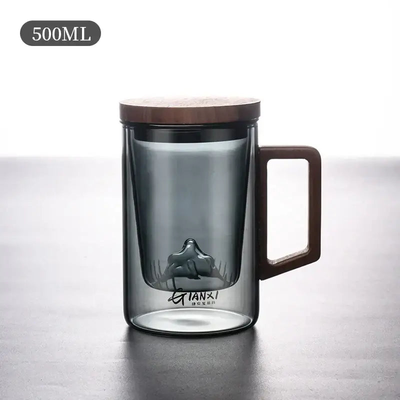 Sleek dark gray double walled glass tea cup with wooden lid kitchen