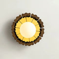 Sunflower yellow and wood wall sconce with matte white glass ball and layered petal shades for bedroom lighting