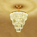 Tiered gold and optical crystal foyer chandelier with cascading clear faceted crystals and gold-finished base inch fixture decorbites optical crystal