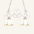 Delicate white wrought iron tiffany style island pendant light with two illuminated blue white stained glass shades