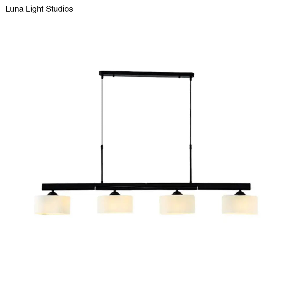 Traditional black drum island pendant with white shades dining room