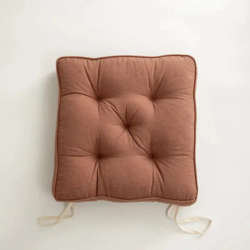 Tufted button cushion in terracotta cream and olive for living room