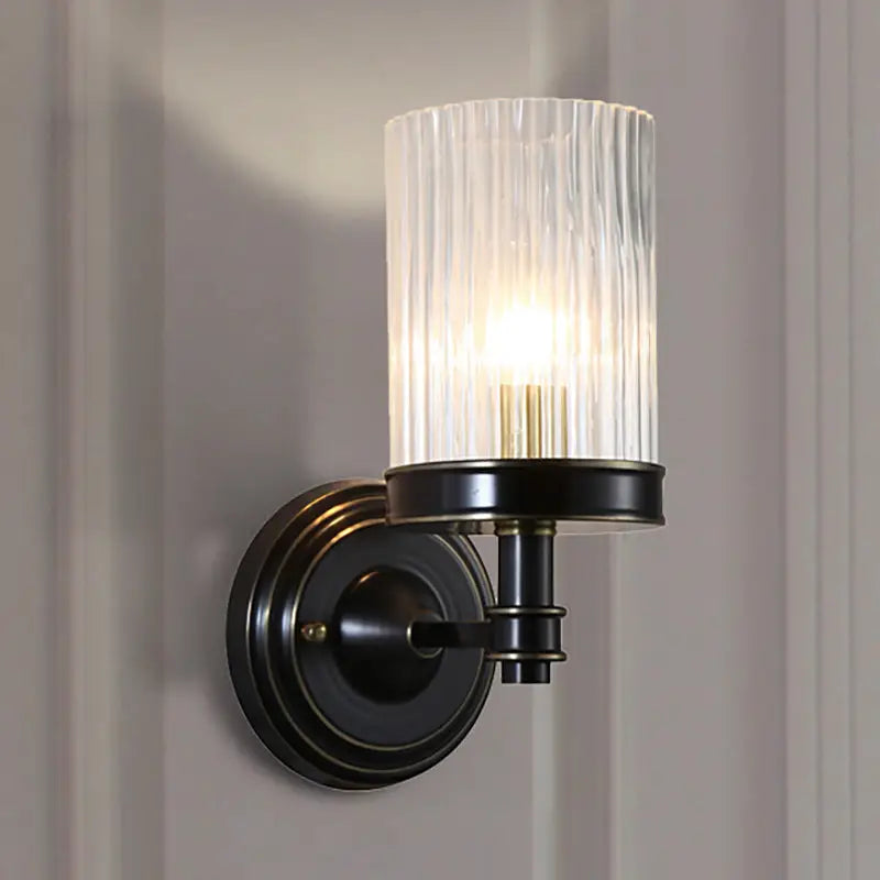 Vintage brass and black clear ribbed glass cylinder wall lamp bedroom