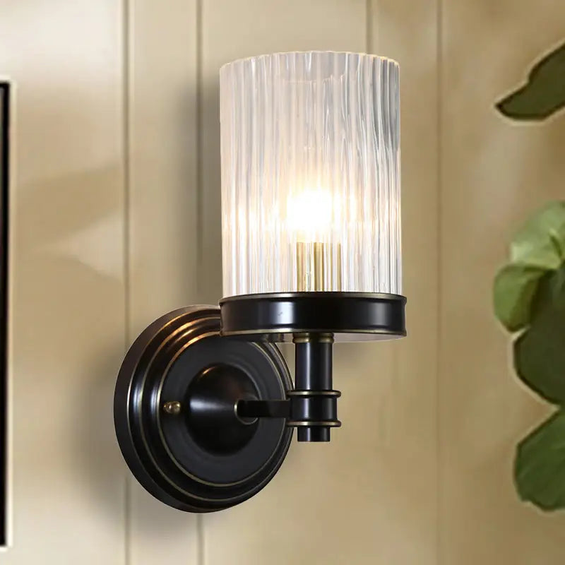 Vintage brass and black clear ribbed glass cylinder wall lamp bedroom