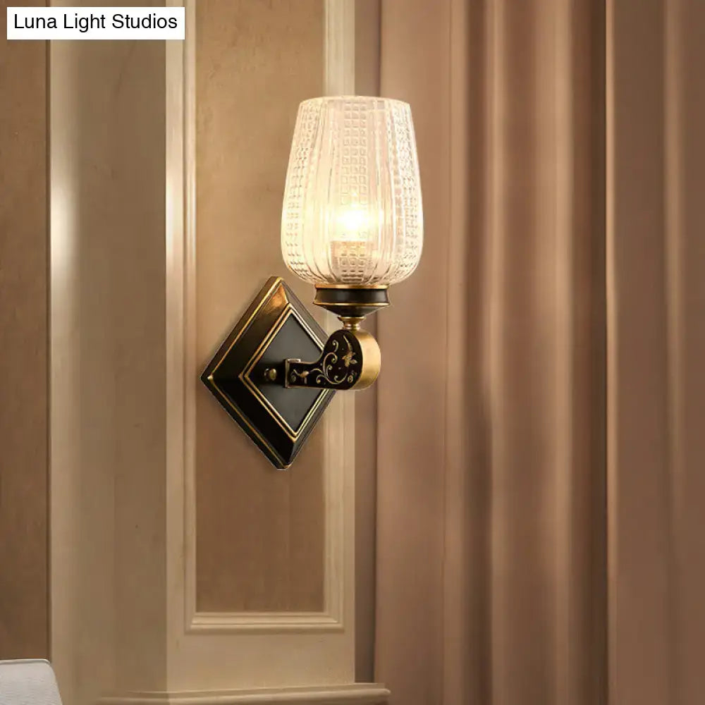 Vintage brass sconce with clear textured glass – living room light
