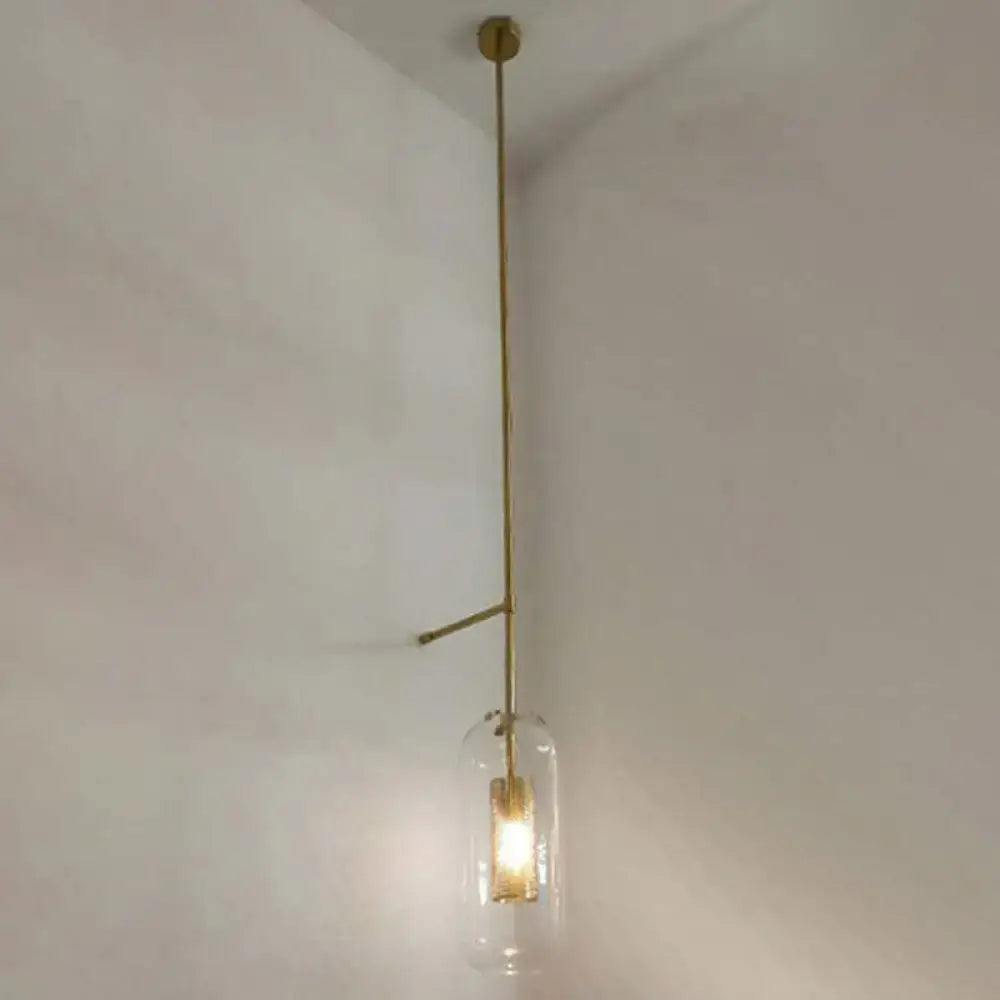 Vintage brass wall lamp with clear glass cylinder – living room sconce