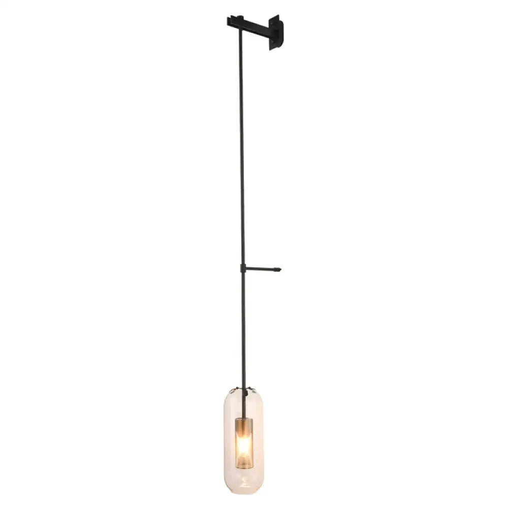 Vintage brass wall lamp with clear glass cylinder – living room sconce