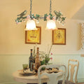 DecorBites white glass island light with vintage frosted shades featuring painted green birds and pink blossoms for rose restaurant suspension