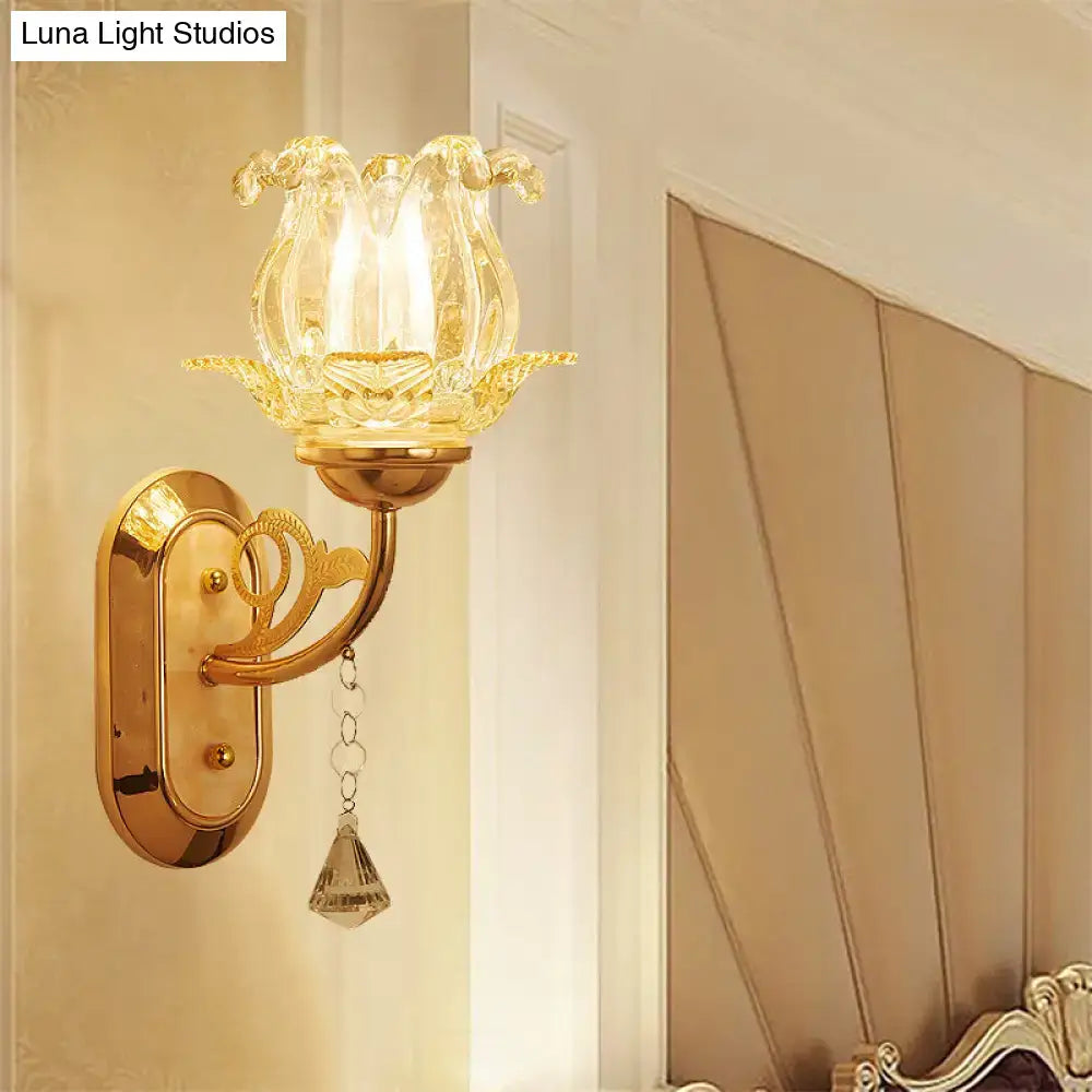 Vintage gold flower wall sconce with amber glass shade bedroom light
