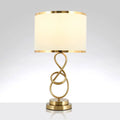 Vintage gold infinity table lamp with fabric shade for bedroom