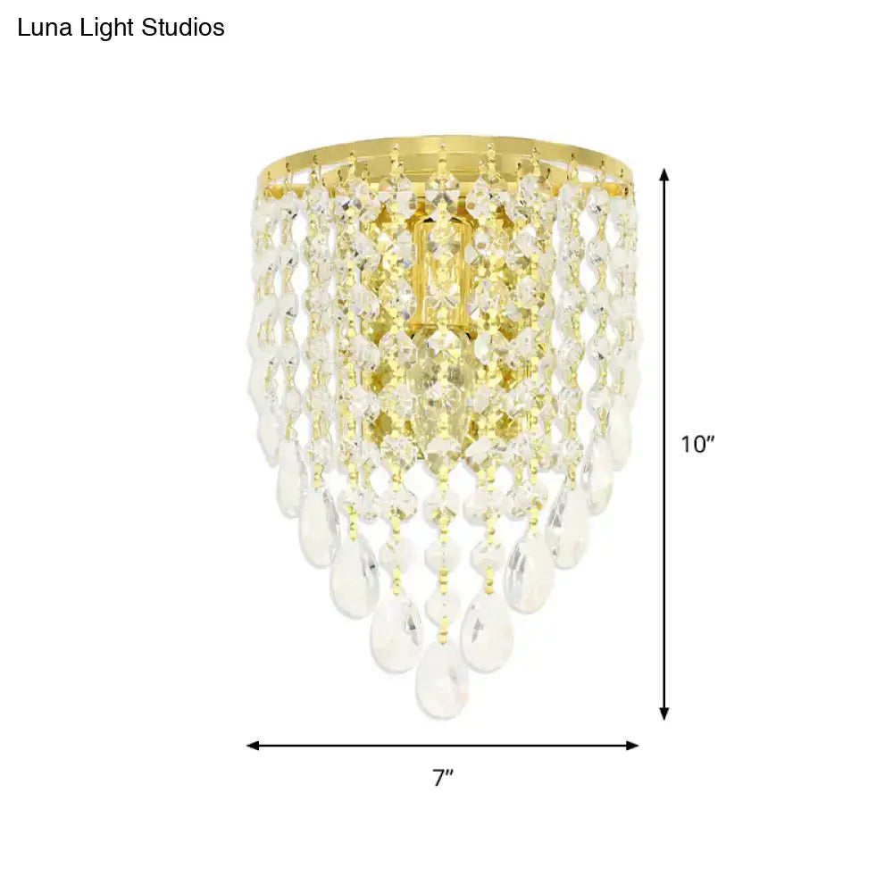 Vintage gold tapered wall mount with clear crystal draping bedroom light