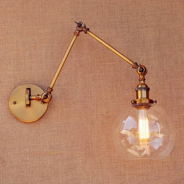 Vintage industrial brass glass ball swing arm light bedroom sconce