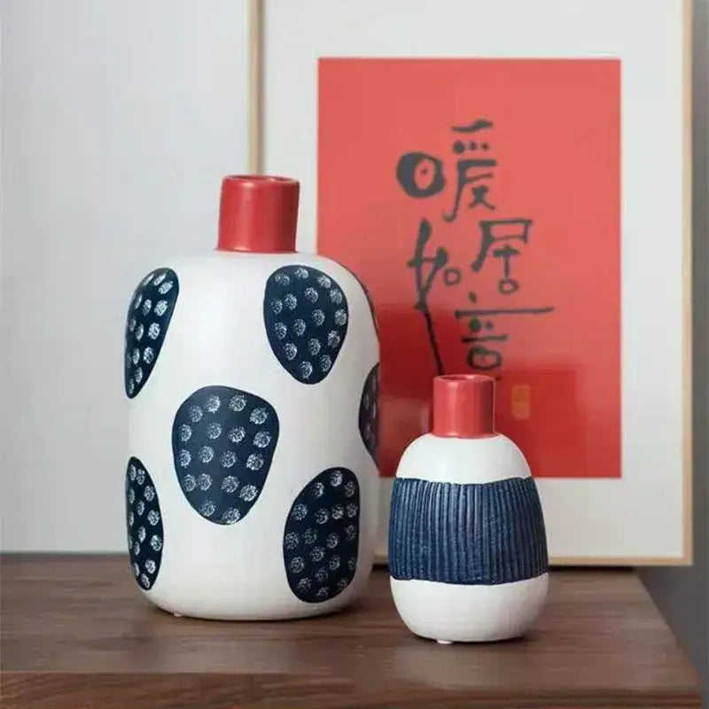 White ceramic polka dot vase with colorful graffiti lines living room