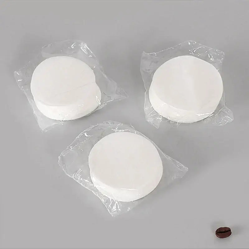 White circular disposable coffee filter papers kitchen espresso tool