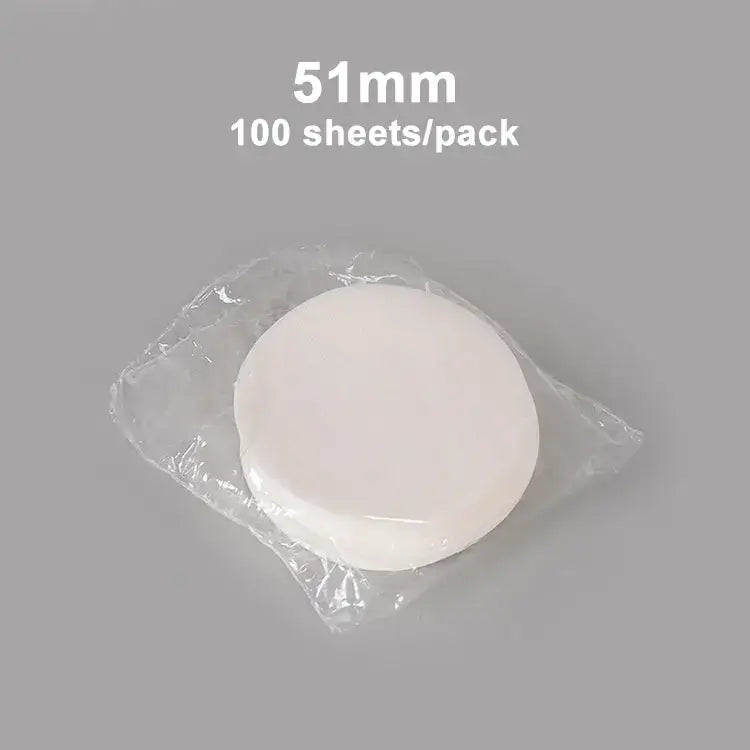 White circular disposable coffee filter papers kitchen espresso tool