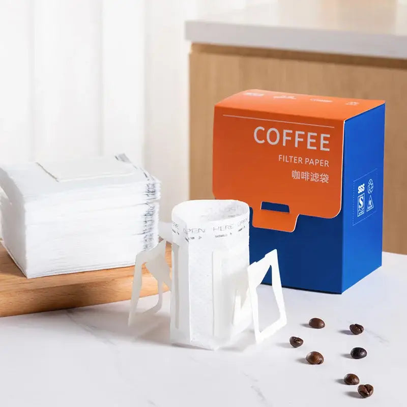 White disposable coffee filter bags kitchen pour over setup