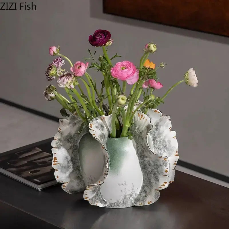 White & gray ruffled ceramic vase with artificial flowers living room