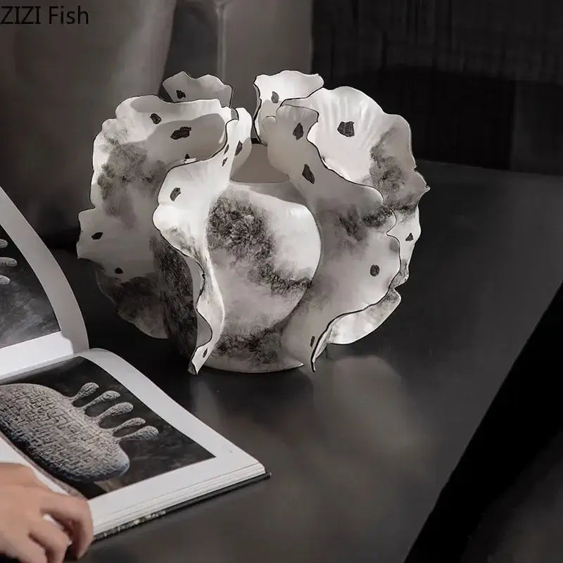 White & gray ruffled ceramic vase with artificial flowers living room