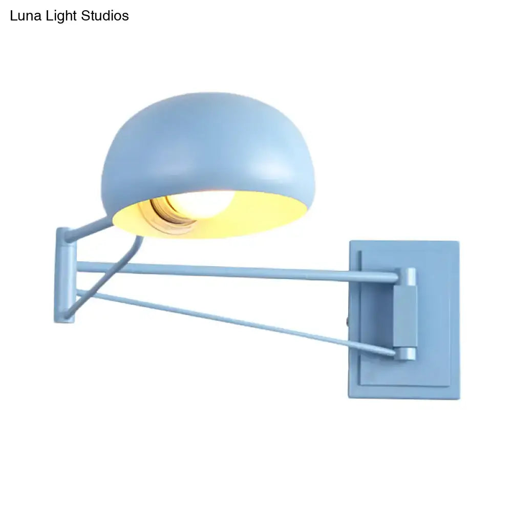 Yellow adjustable metal wall sconce with bowl shade for bedroom