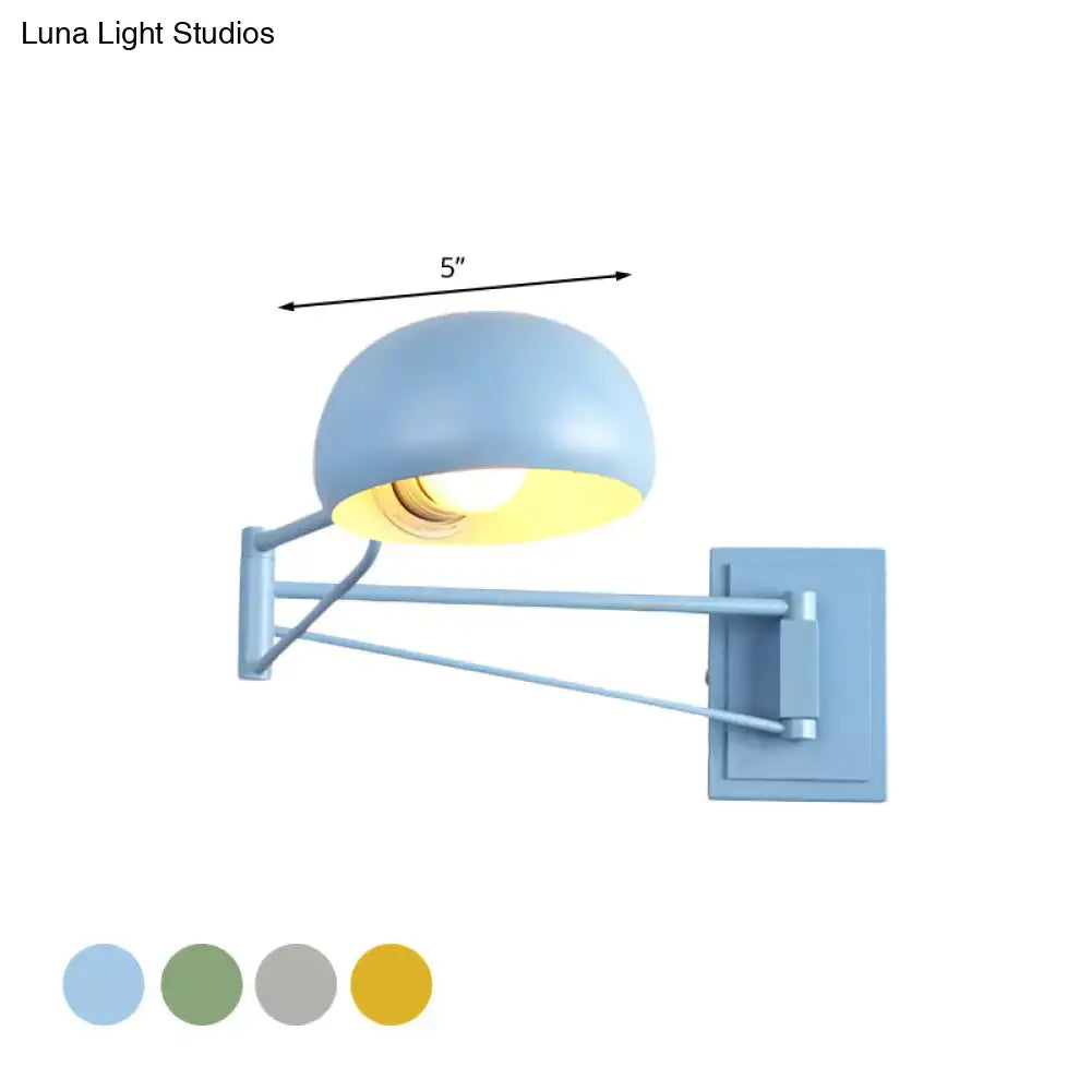 Yellow adjustable metal wall sconce with bowl shade for bedroom
