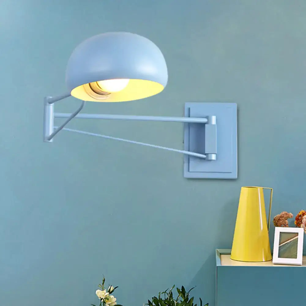 Yellow adjustable metal wall sconce with bowl shade for bedroom