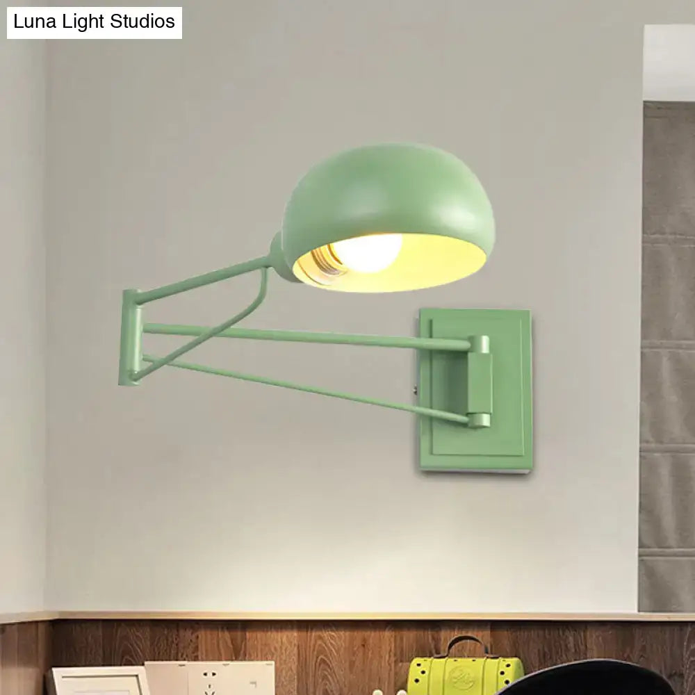 Yellow adjustable metal wall sconce with bowl shade for bedroom