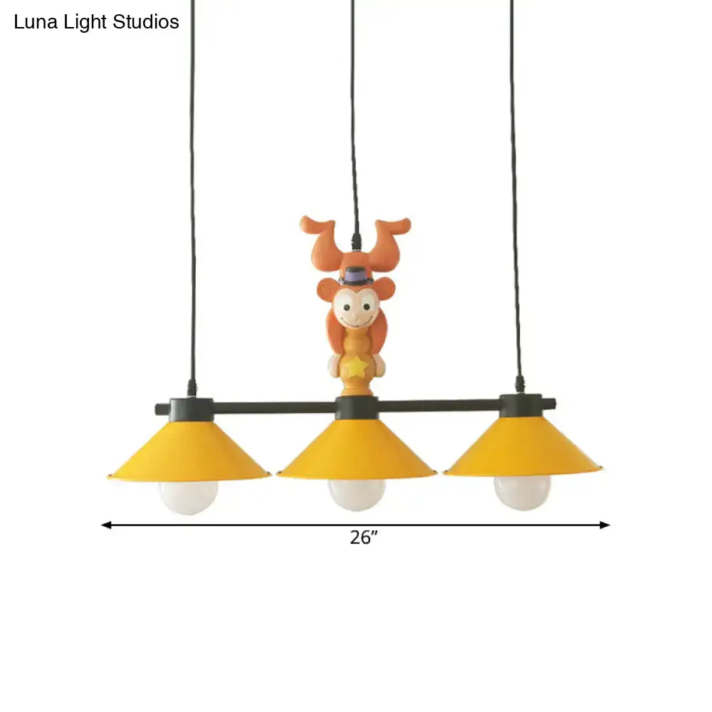 Yellow and orange monkey kitchen island pendant with yellow cone shades
