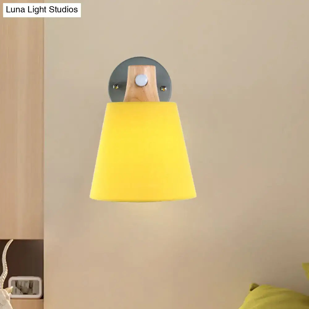 Yellow macaron fabric wall light with wood accent bedroom sconce