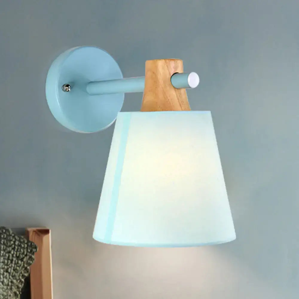 Yellow macaron fabric wall light with wood accent bedroom sconce